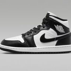 Nike Air Jordan Black and White (women’s size 8.5/ men’s size 7)